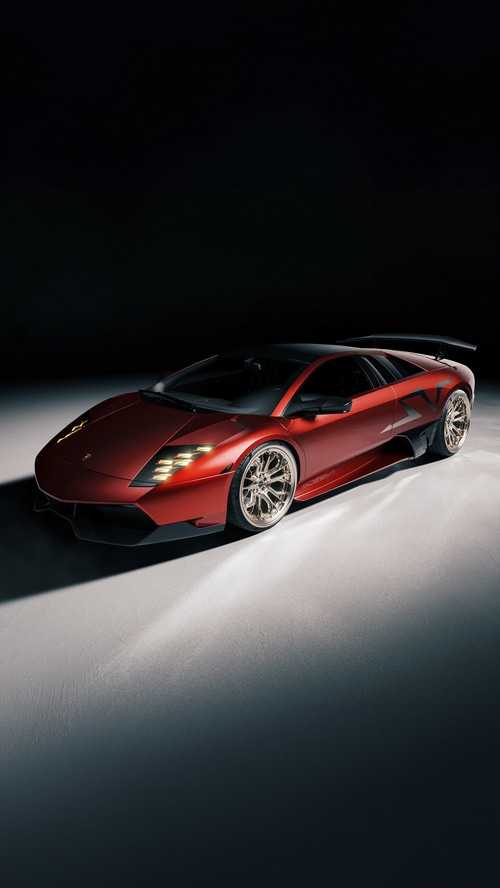 Red Lamborghini Murcielago with custom wheels