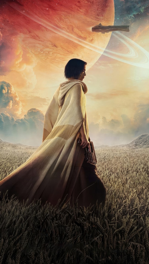 Rebel Moon character in a wheat field with a planet in the sky