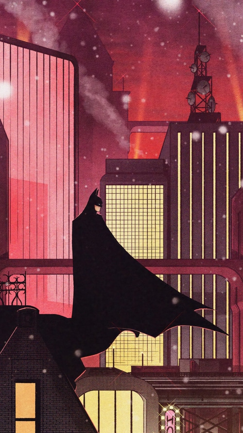 Batman in a snowy Gotham City