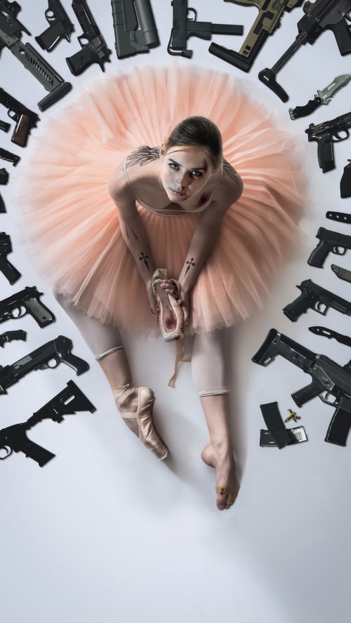 Ballerina surrounded by guns