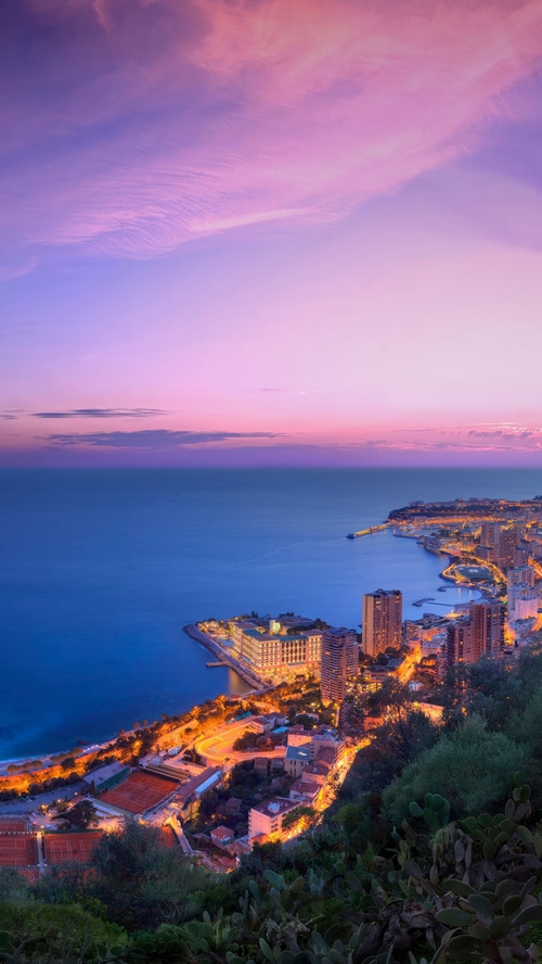 Monaco cityscape at sunset with ocean view