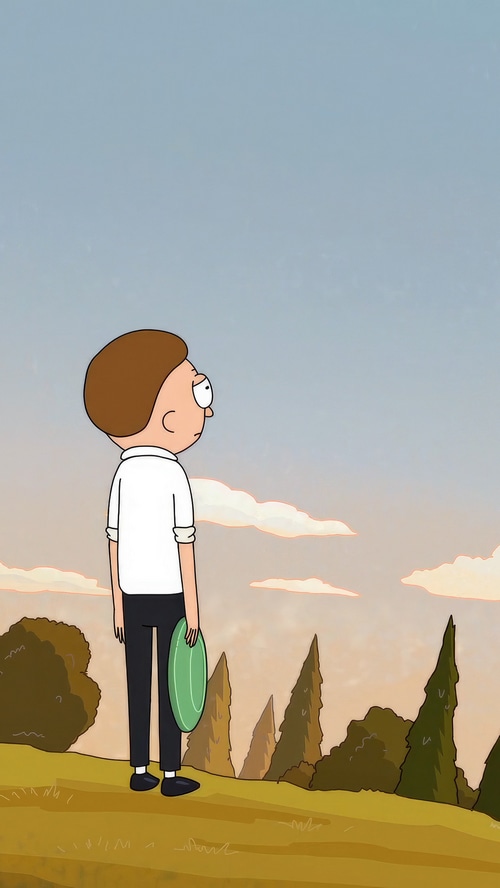 Morty Smith holding a frisbee in a field