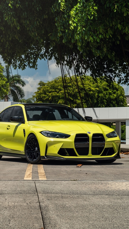 Yellow BMW M3 Sedan with Black Wheels