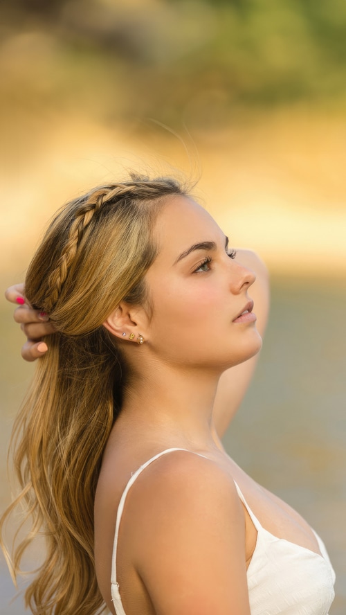 Girl with blonde hair in a white dress
