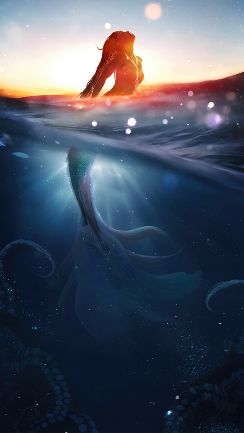 Ariel the Mermaid in the Ocean at Sunset