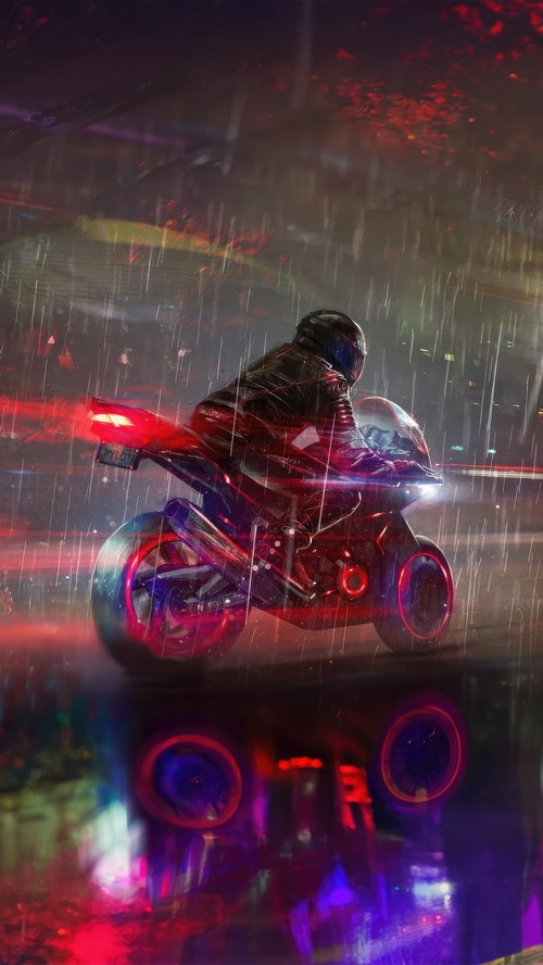 Biker riding a motorcycle in the rain
