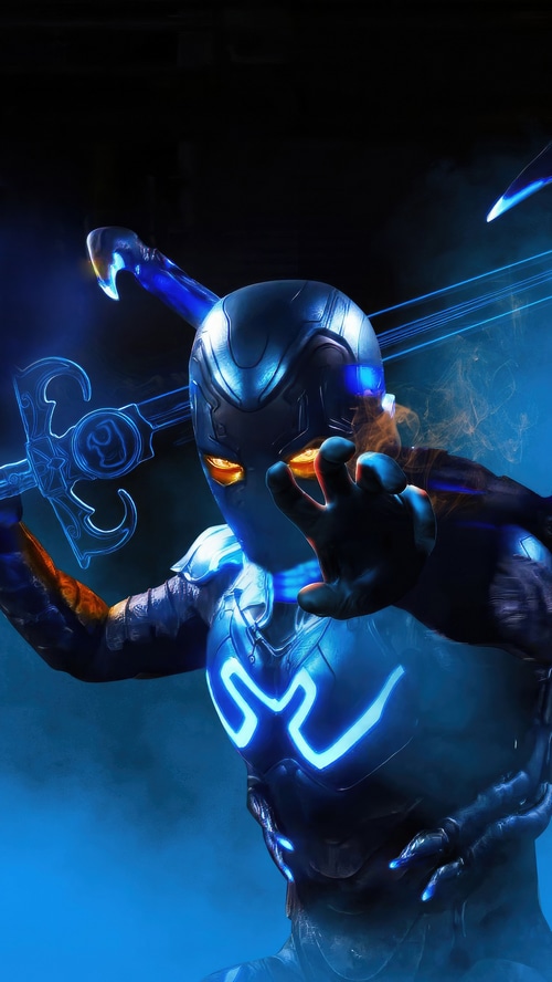 Blue Beetle holding a sword in a movie