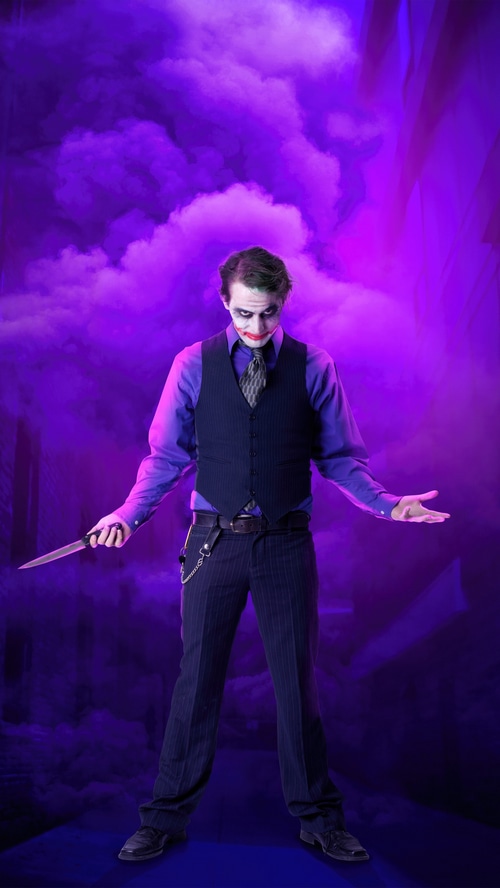 Joker Cosplay with Knife and Purple Smoke