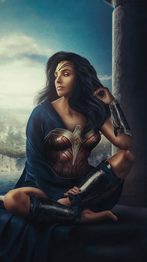 Wonder Woman sitting by a stone pillar
