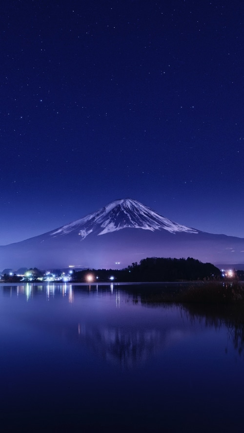Mount Fuji reflected in Lake Kawaguchi at night