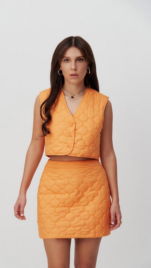 Millie Bobby Brown in orange quilted set