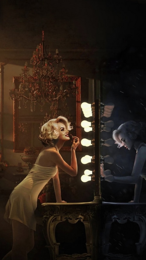 Marilyn Monroe applying makeup in a dressing room