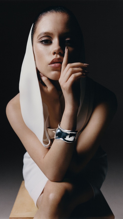 Jenna Ortega posing with jewelry