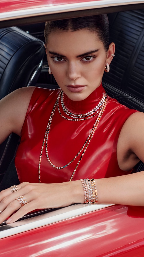 Kendall Jenner in a red dress with jewelry