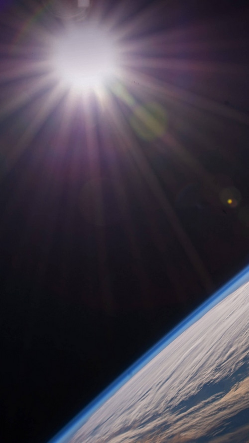 Sunlight Over Earth From Space