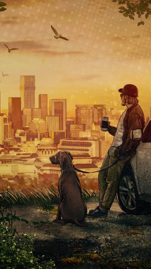 Man and dog overlooking city at sunset