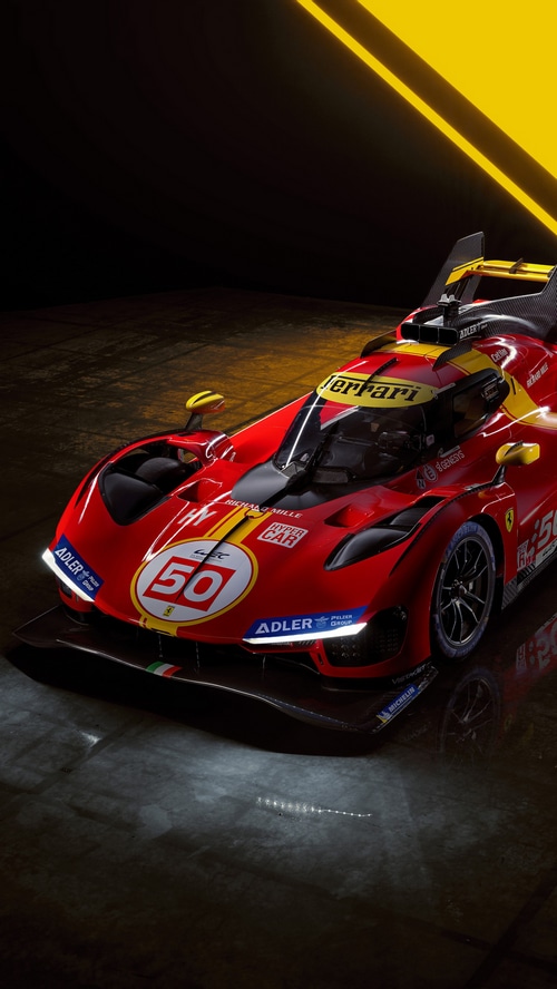 Ferrari 499P race car with yellow accents
