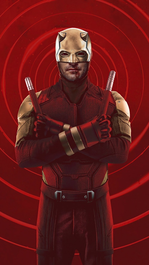 Daredevil holding his billy clubs