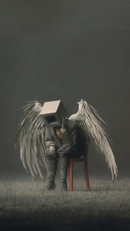 Angel with a box head sitting on a chair