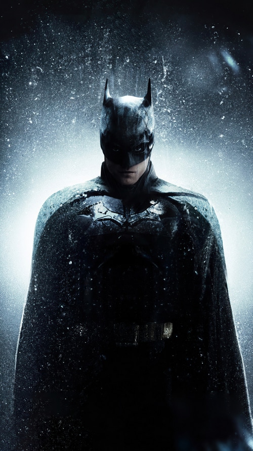 Batman in a dark, snowy environment