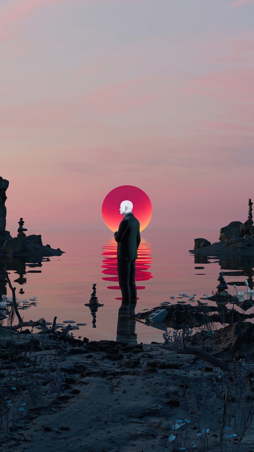 Man in suit facing a large red sun over water