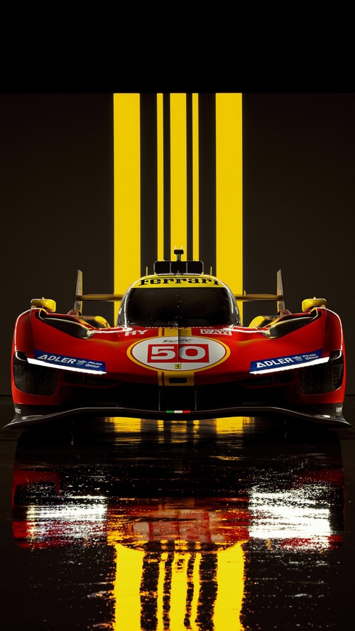 Ferrari 499P race car with yellow stripes