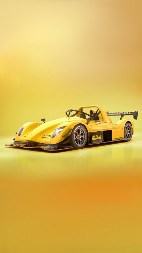 Yellow Radical SR3 race car on a yellow background