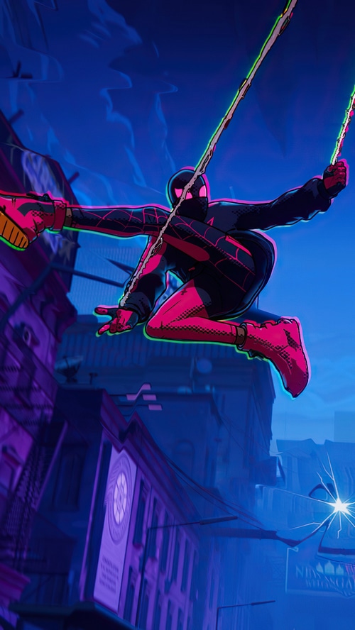 Spider-Man Swinging Through City at Night