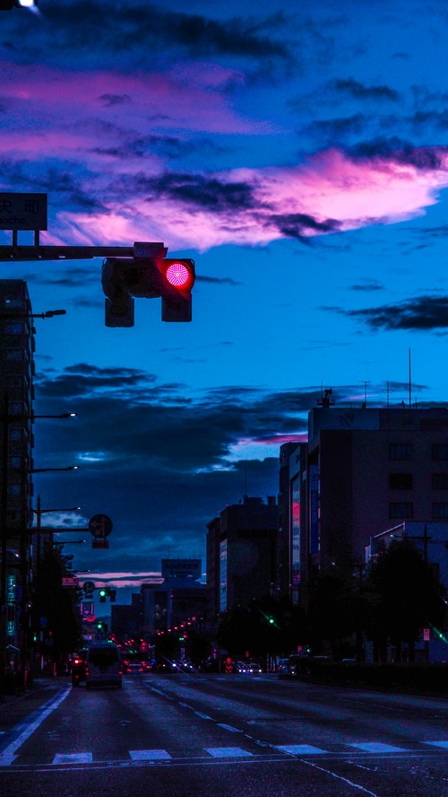City street at dusk with traffic lights