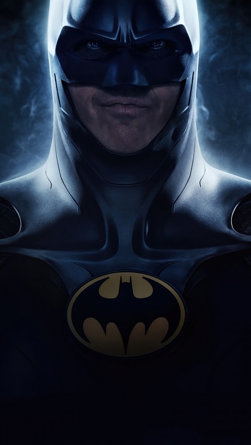 Batman in his suit with the bat symbol