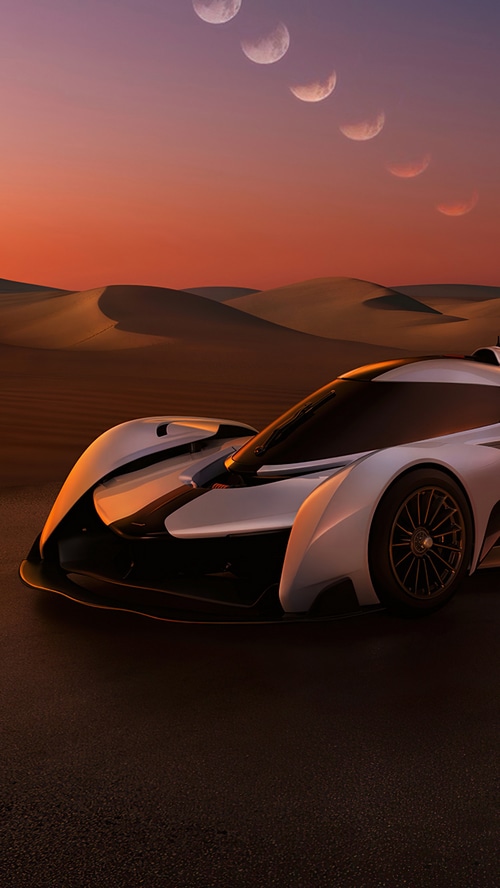 McLaren Solus GT in a desert at sunset