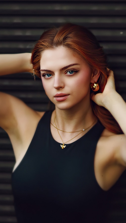 Redhead model with bee necklace
