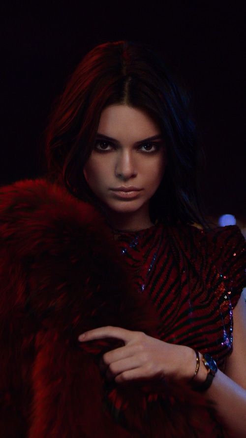 Kendall Jenner in a red sequined dress and fur