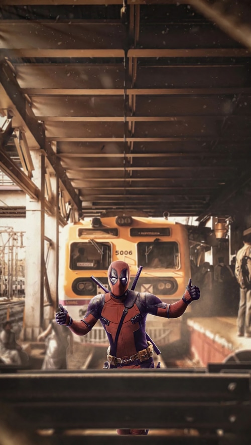 Deadpool giving thumbs up at a train station