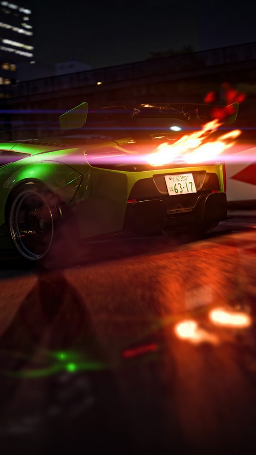 Green McLaren 650S with flames from exhaust