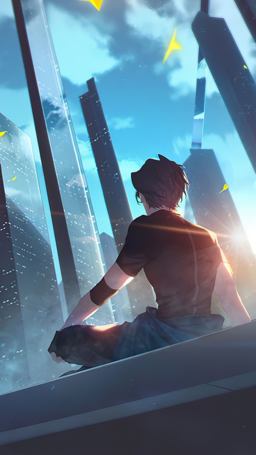 Man sitting on a ledge overlooking a futuristic city