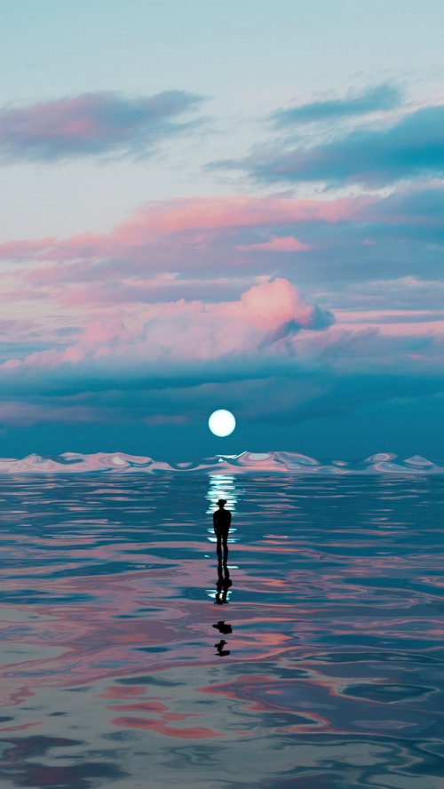 Man standing on reflective water with sun and clouds