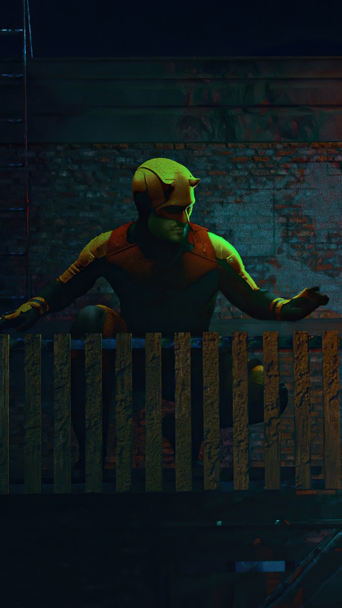 Daredevil in yellow suit on a rooftop
