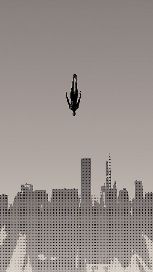 Spider-Man falling over a city skyline