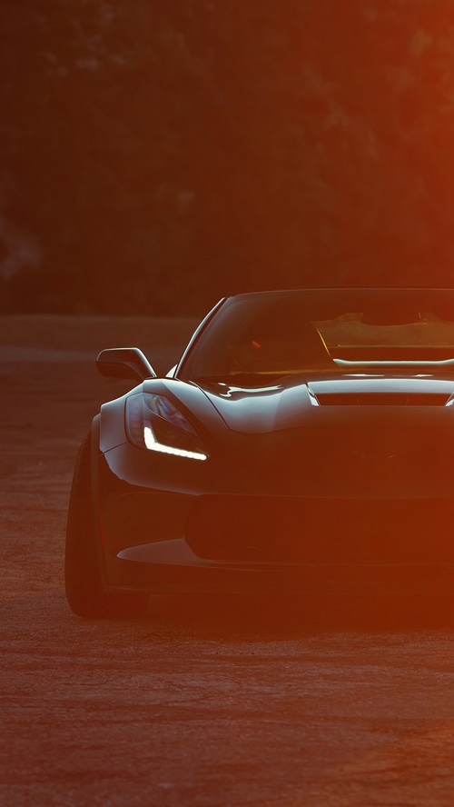 Chevrolet Corvette C7 front view at sunset