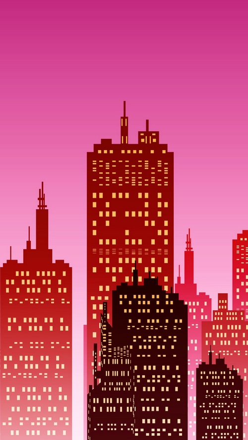 City skyline at sunset with illuminated buildings