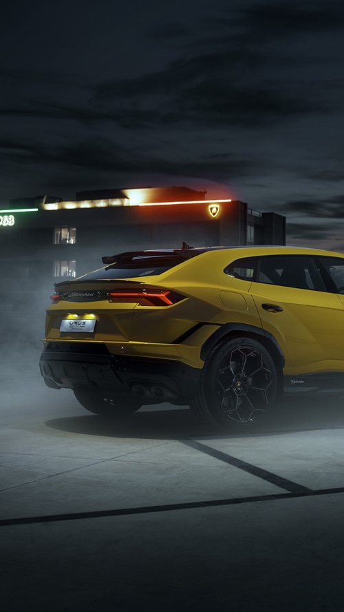Yellow Lamborghini Urus at Night