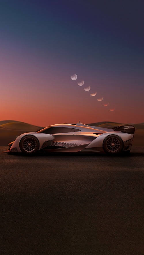 McLaren Solus GT in a desert landscape at sunset