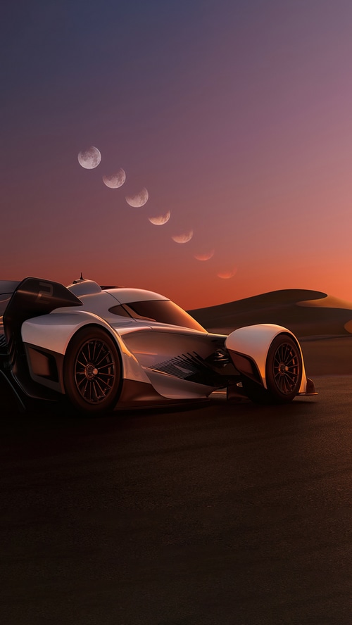 McLaren Solus GT in a desert landscape at sunset