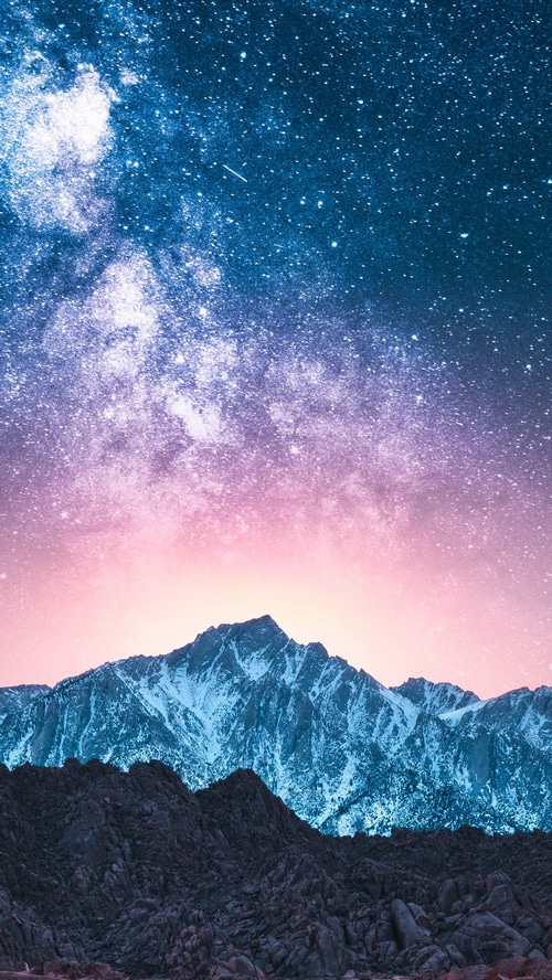 Milky Way over snow-capped mountains
