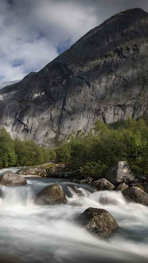 Mountain landscape with a river and trees
