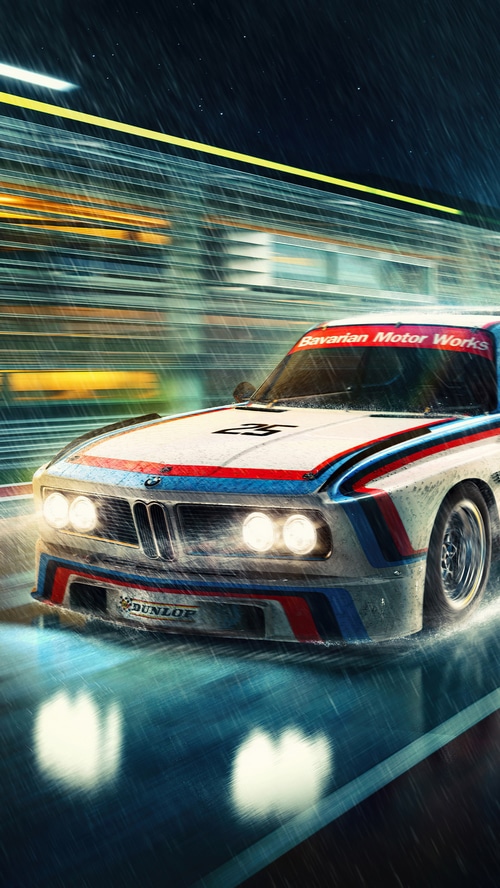 BMW race car driving in the rain