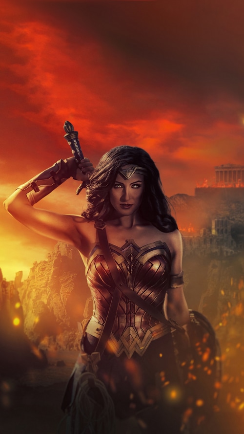 Wonder Woman with Sword and Shield in a Fiery Landscape