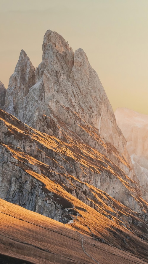 Majestic mountain peaks bathed in golden hour light
