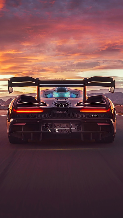 McLaren Senna driving at sunset